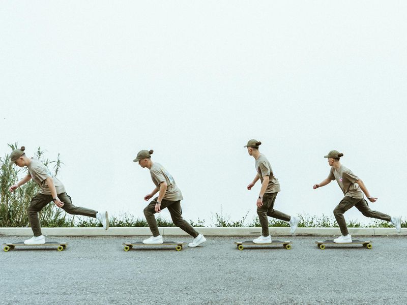 A sequence of movements showing a person's progression through an exercise.